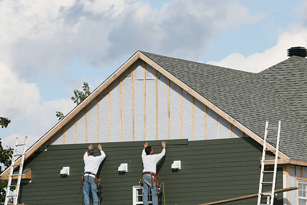 Professional Siding Contractor technician working in Fletcher, OH